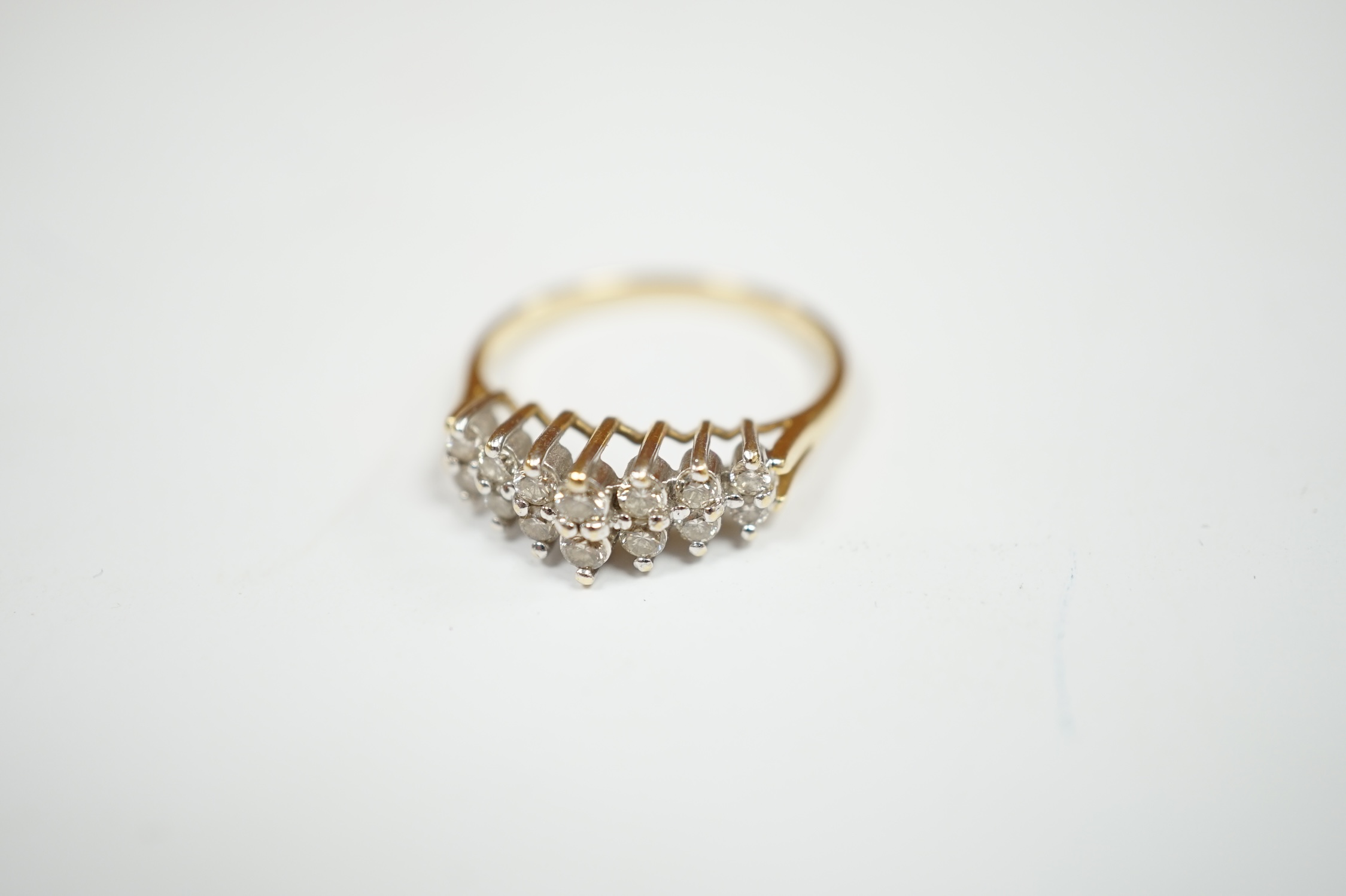 A modern 14k and diamond cluster set two row ring, size O, gross weight 2.9 grams. Condition - fair to good